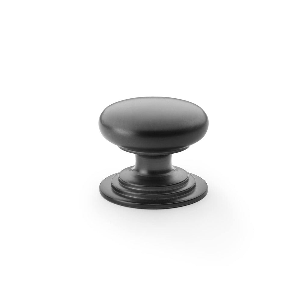 Round Brass Cupboard Knob on Stepped Rose Black