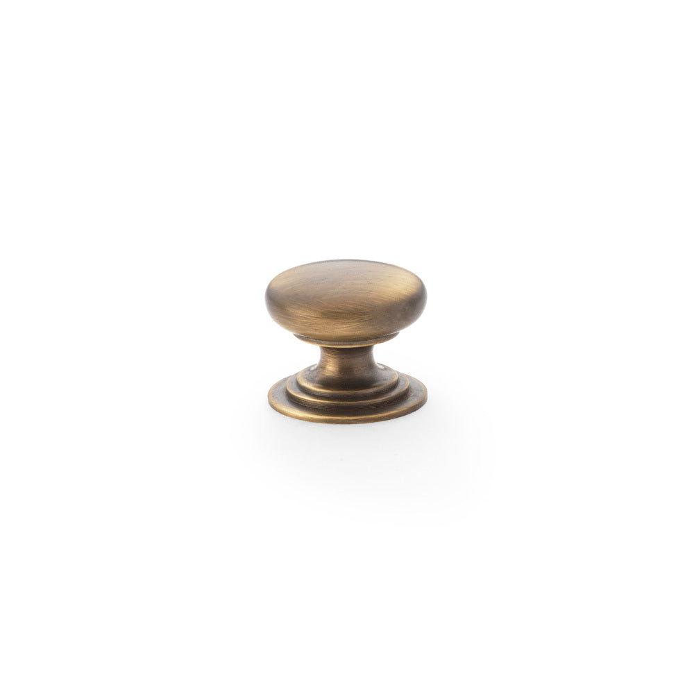Round Brass Cupboard Knob on Stepped Rose Antique brass