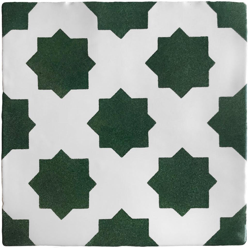 Green hand painted tiles with a star design