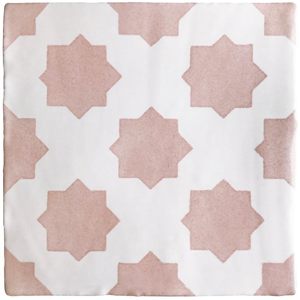 Pink hand painted tiles with a star design