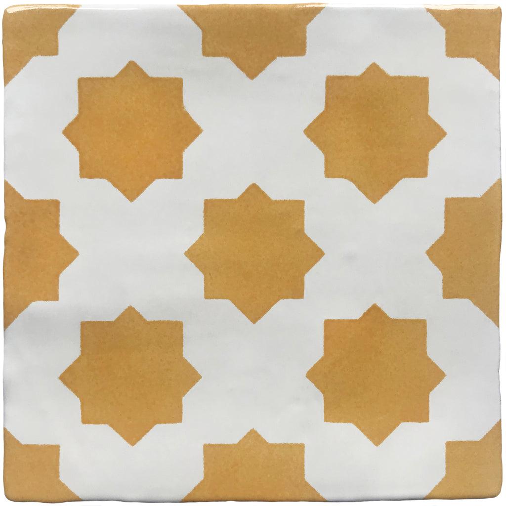 Yellow hand painted tiles with a star design