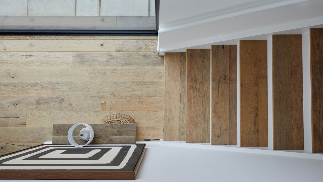 Reclaimed wood used to lay a modern flooring and stair case 