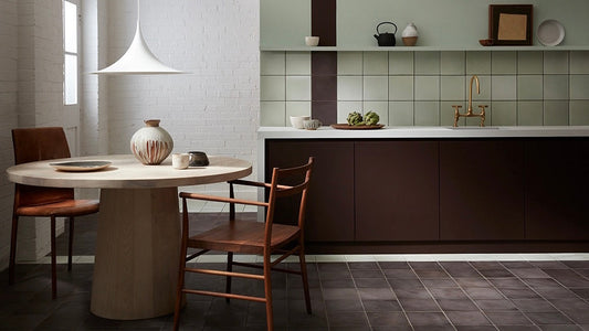 Modern kitchen with mid-cents furniture and pistachio tiles 