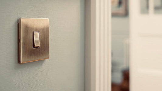 Brushed brass rocker light switch
