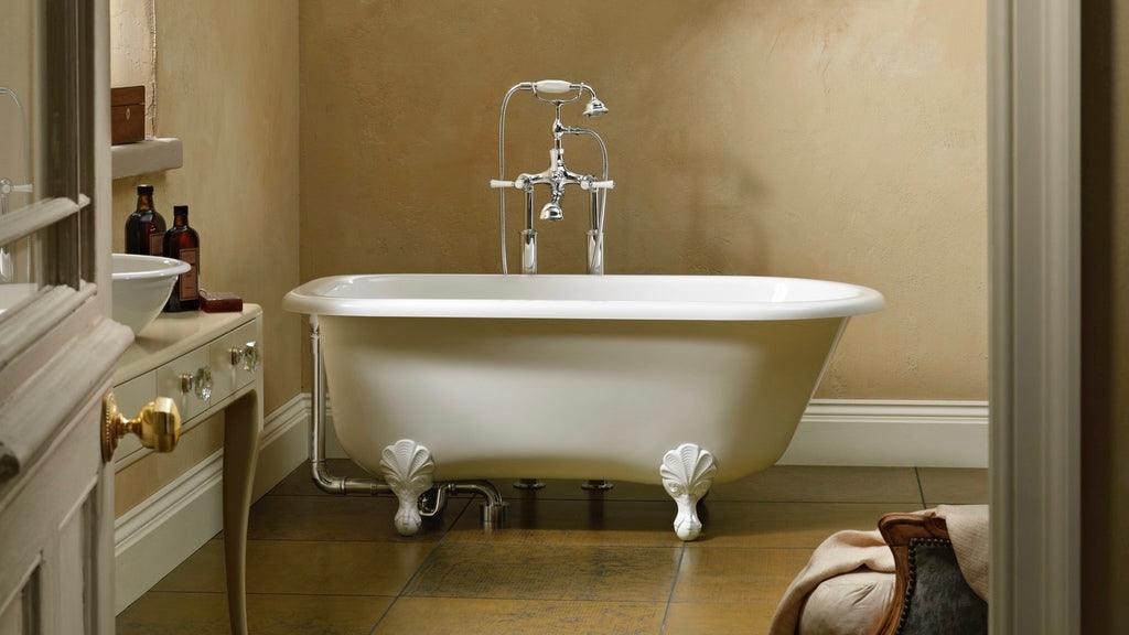 Clawfoot bath tub in rustic bathroom 