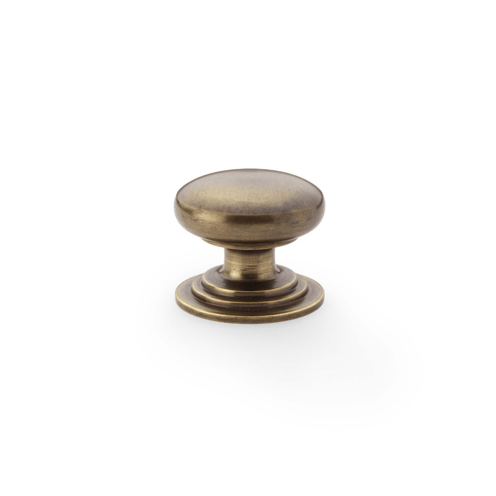 Round Brass Cupboard Knob on Stepped Rose Antique brass