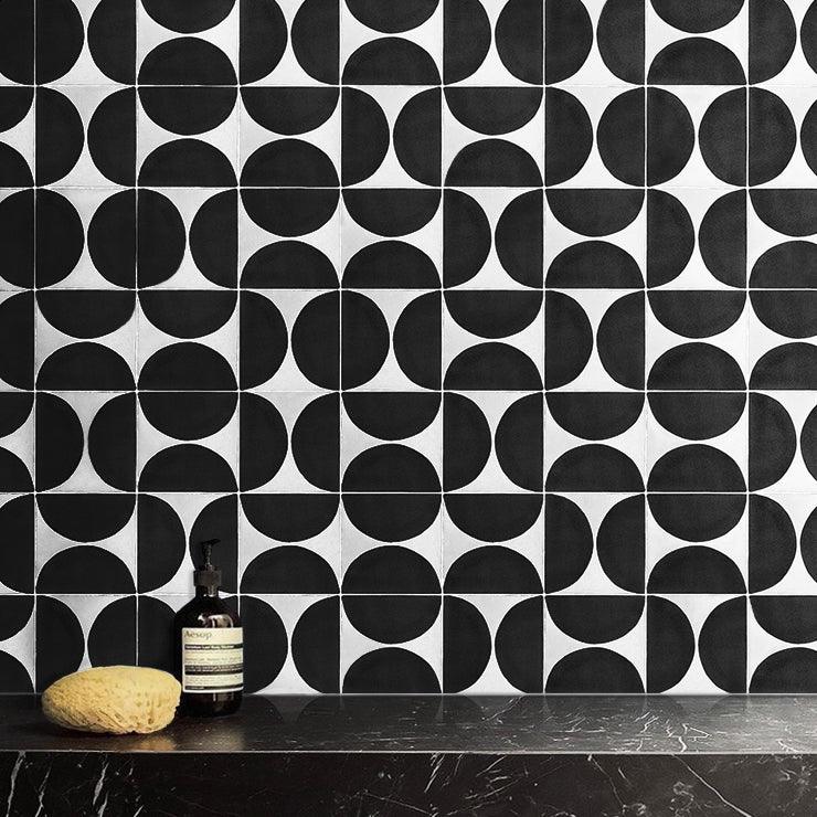 Black hand painted tiles in a stylish bathroom 