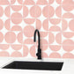 Pink hand painted tiles with stylish black facet and basin 
