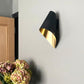 Brass Asymmetric Wall Light In stylish home 