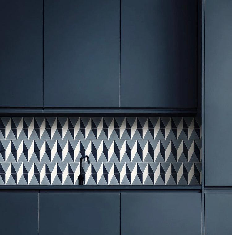 Geometric tiles used as a backsplash in a stylish kitchen