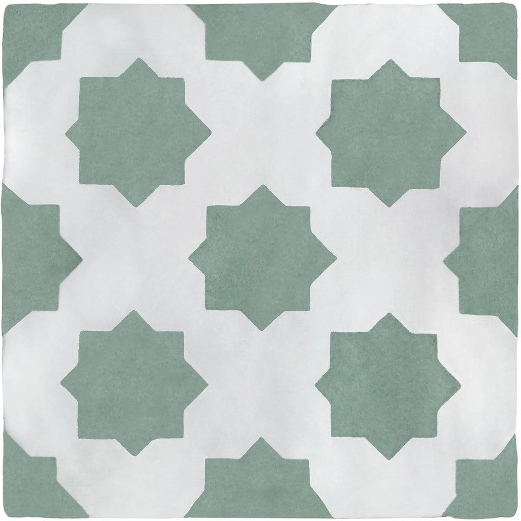 Green hand painted tiles with a star design 